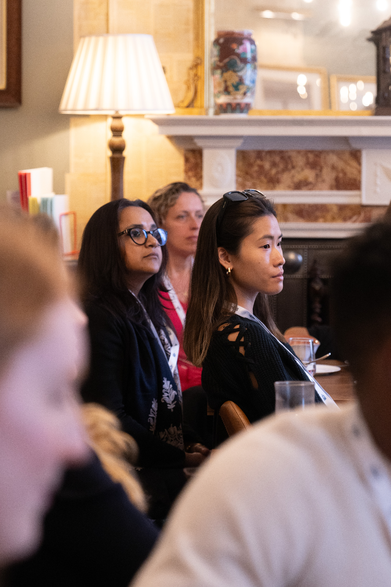 Attendees listening intently at a Homegrown investor gathering